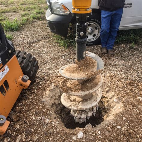 belltec post hole digger skid steer|digging holes in rocky ground.